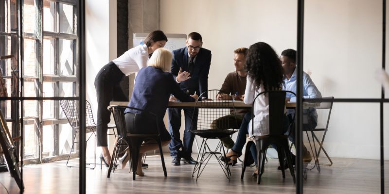 group of attorneys collaborating at growing law firm